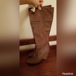 Brown leather boots.